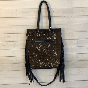 Handmade Guatemalan fringe and cowhide bag